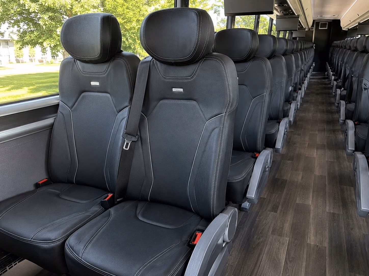 how the time of year and peak seasons affect charter bus rental prices in suffolk
