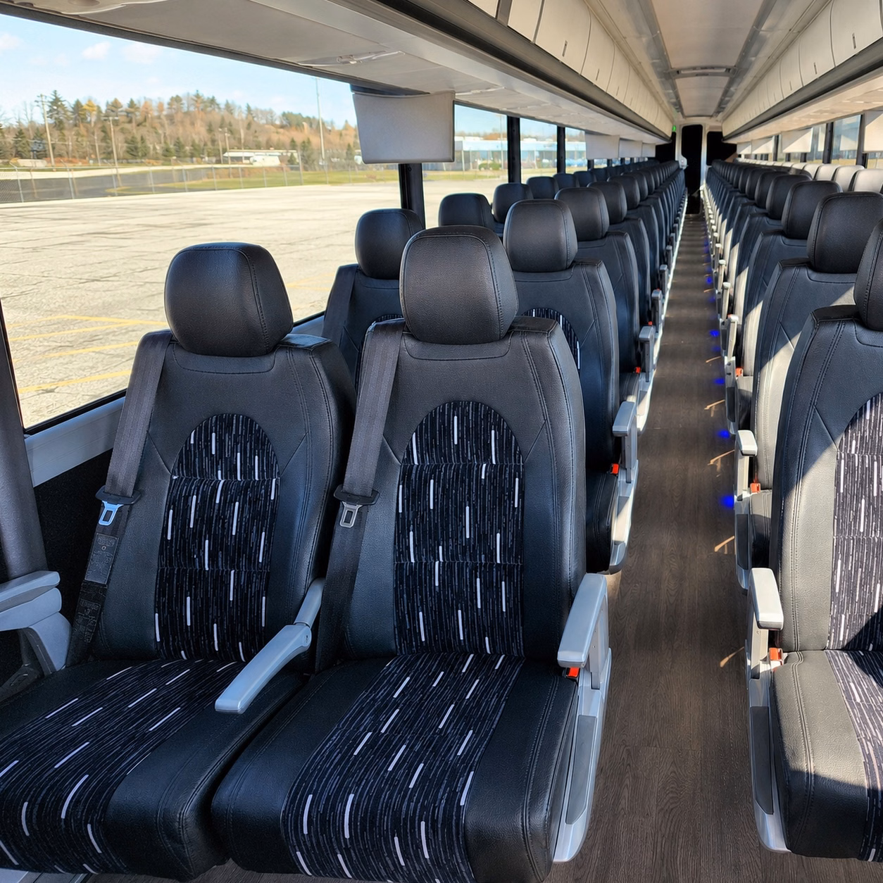 how trip distance and duration affect charter bus rental rates in suffolk